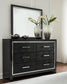 Kaydell Queen Upholstered Panel Headboard with Mirrored Dresser and 2 Nightstands